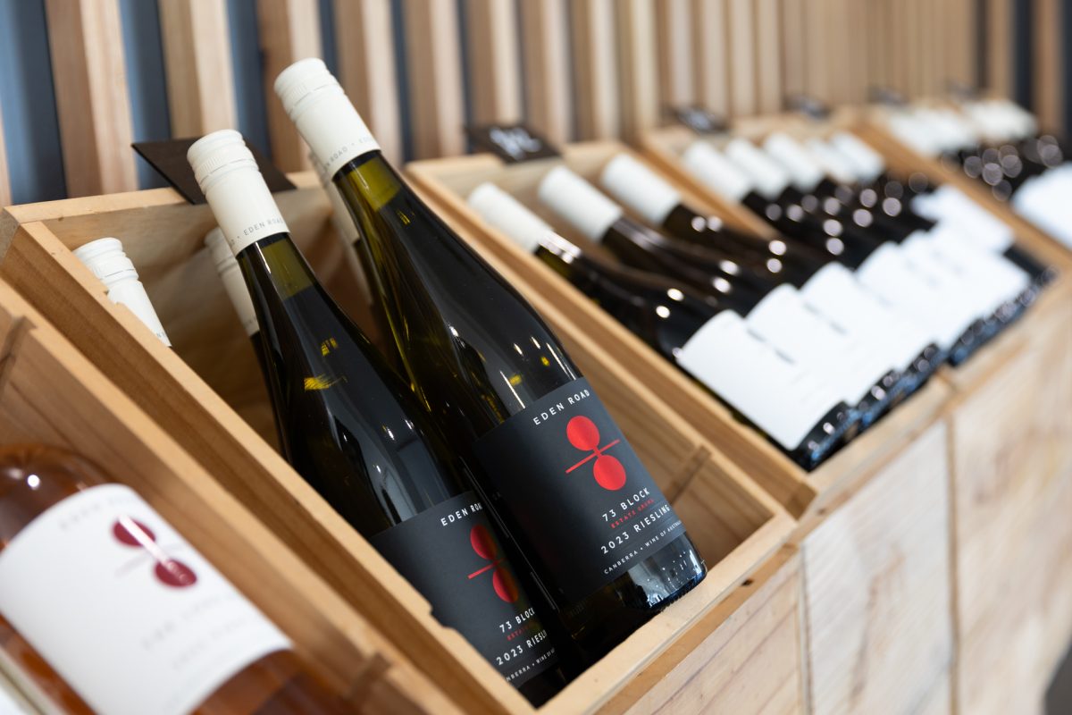 A row of wine bottles for sale
