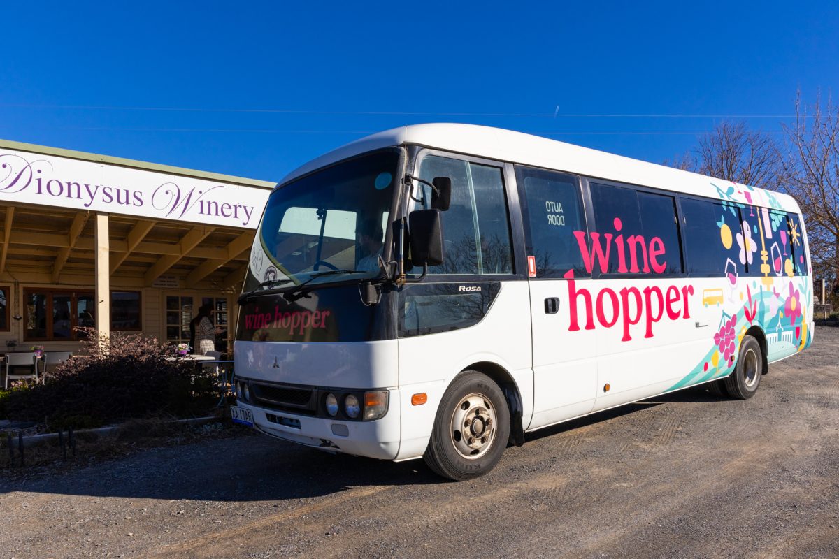 wine hopper bus parked outside Dionysus Winery cellar door