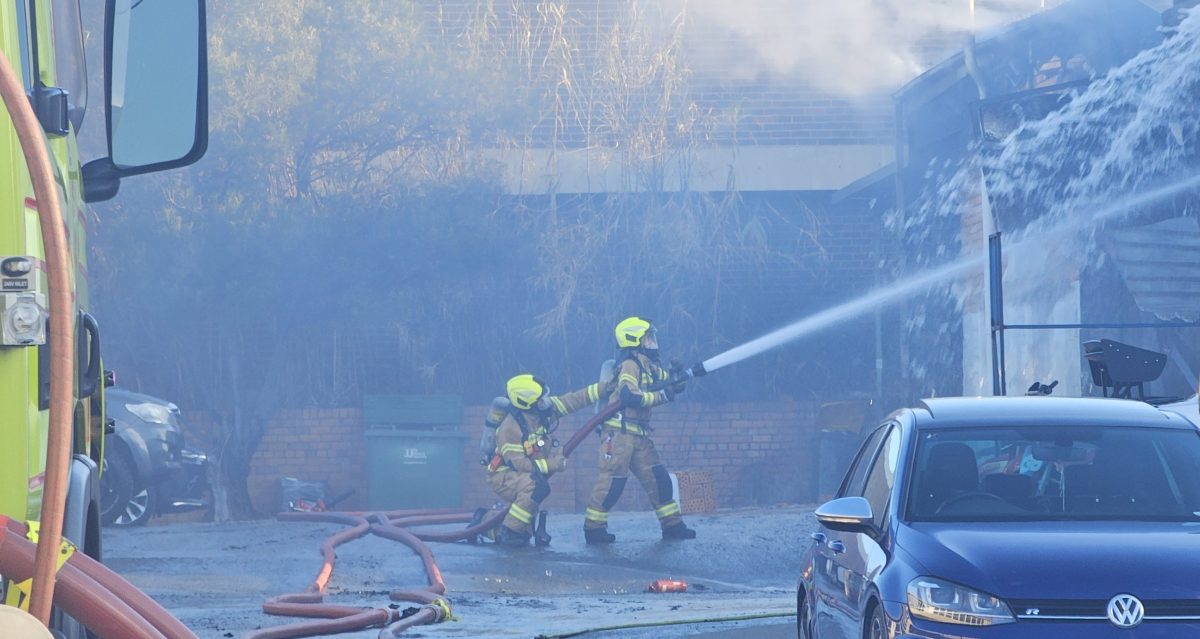 Firefighters work to contain blaze