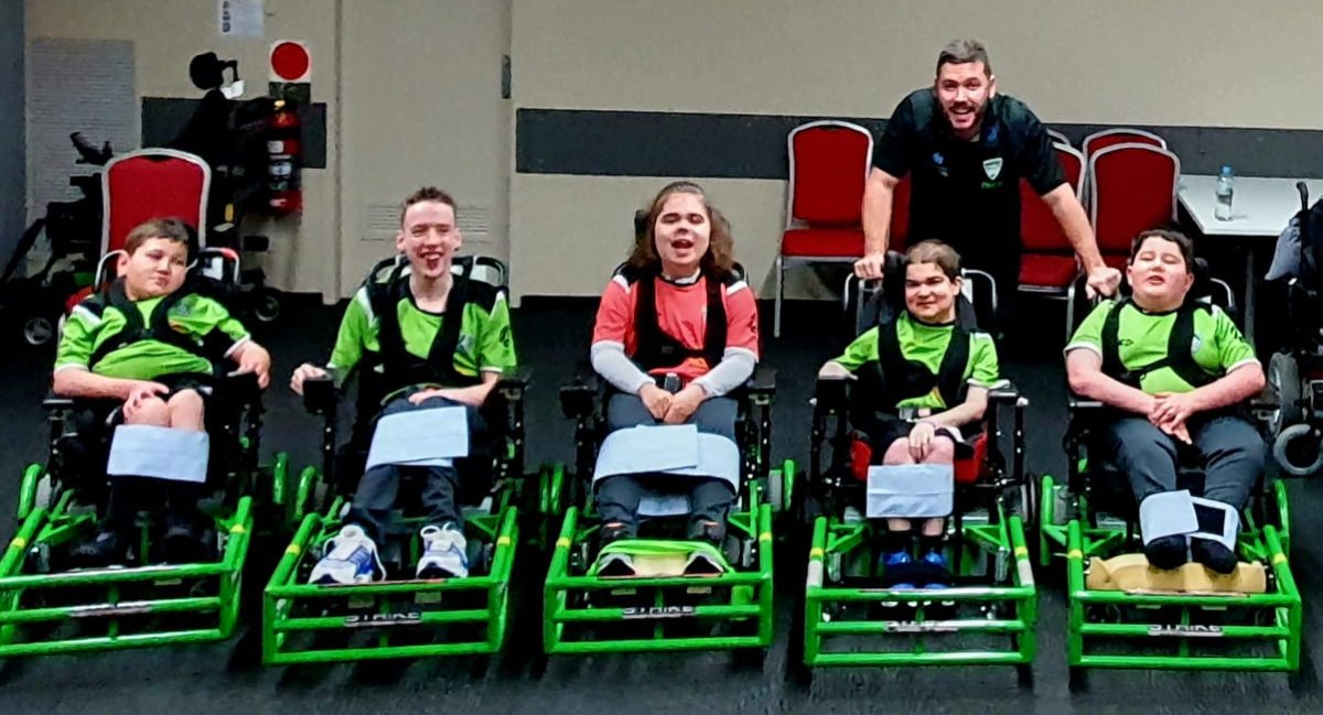 A kids Canberra powerchair football team.