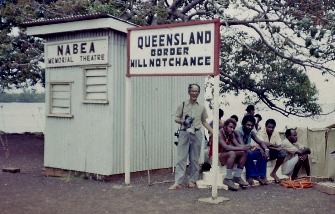Building with sign Queensland Border