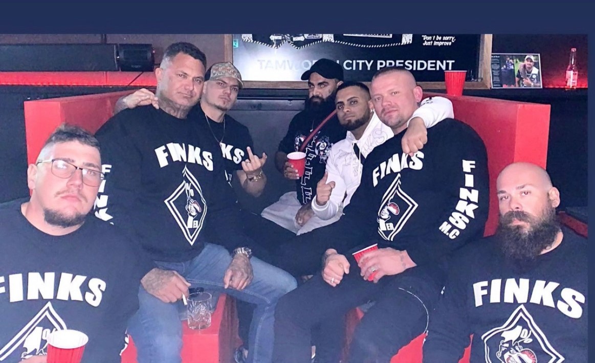 Former Safe Hands 002 Pty Ltd director Branden Jones, bottom left, with Finks members.