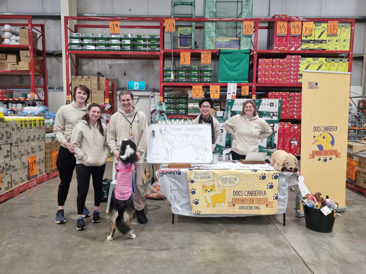 Members of the Dogs Canberra team at a stall inside Bunnings