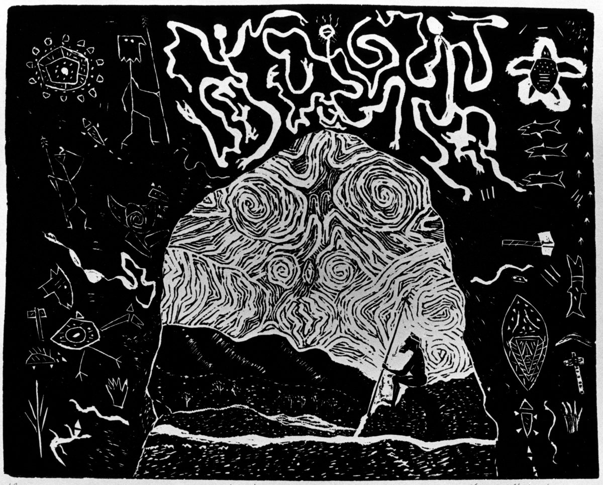 Black & white image of a man in a cave