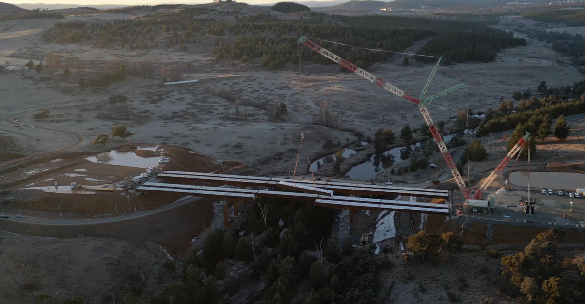 crane installing bridge girder