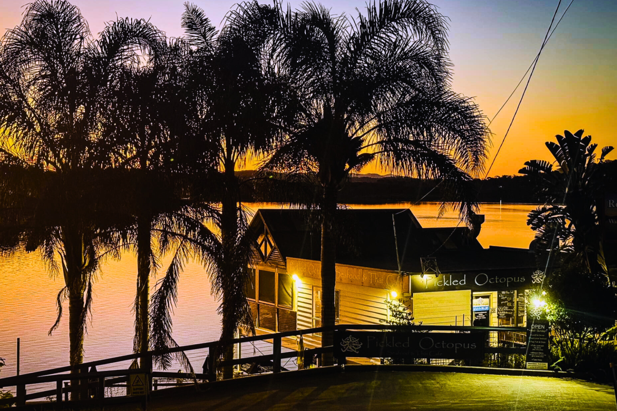 The Pickled Octopus Restaurant overlooking a river.