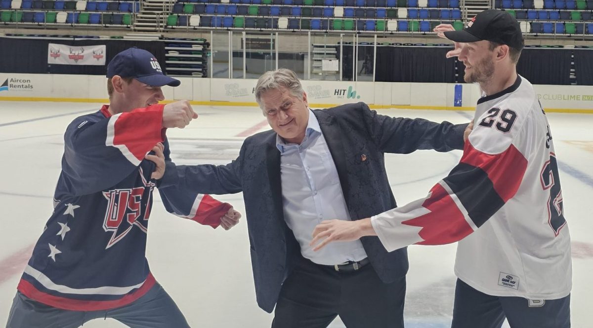 Matt Clark, Kerry Goulet, Joel Hasselman pretending to fight at AIS stadium