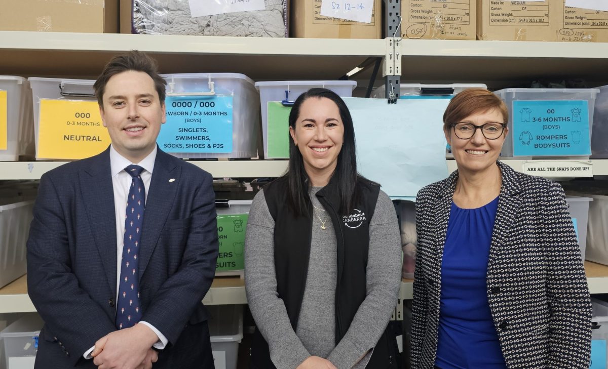 Hanah Andrevski standing with ministers Michael Petterson and Rachel Stephen Smith