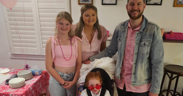 Little Alara rides a wave of support raising funds and awareness for childhood dementia