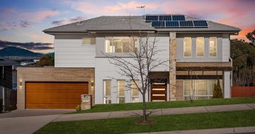 Private, elevated home has horizon views and suburban convenience