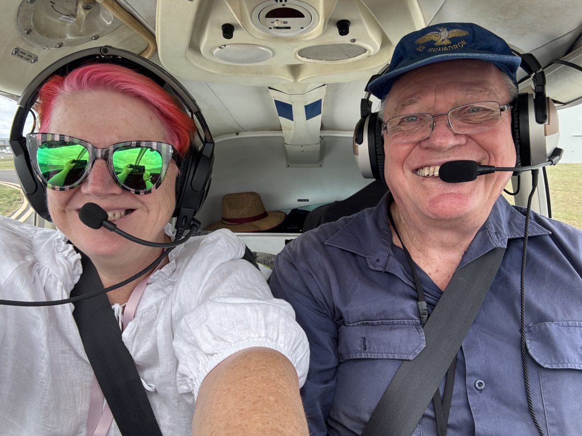 Couple in plane cockpit