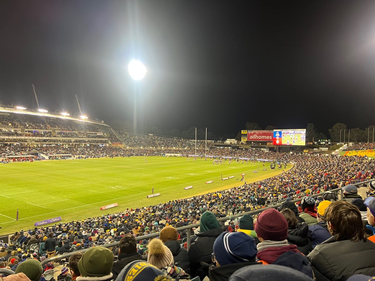 A large crowd watches on as the Brumbies play the British and Irish Lions at GIO Stadium. Photo: Tim Gavel.
