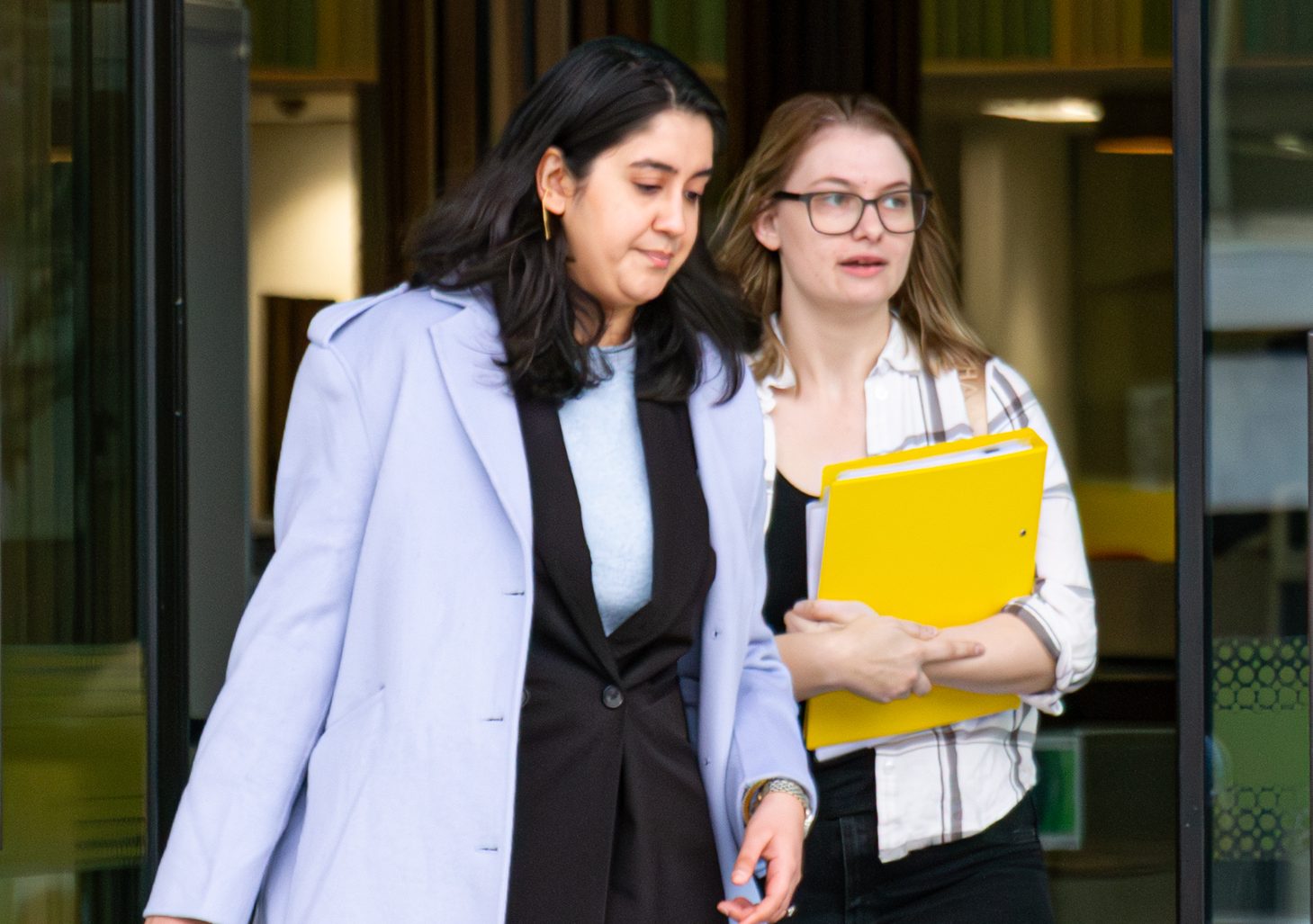 Two women pictured outside court.