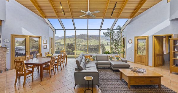 Mountain retreat home with river frontage needs no hyperbole