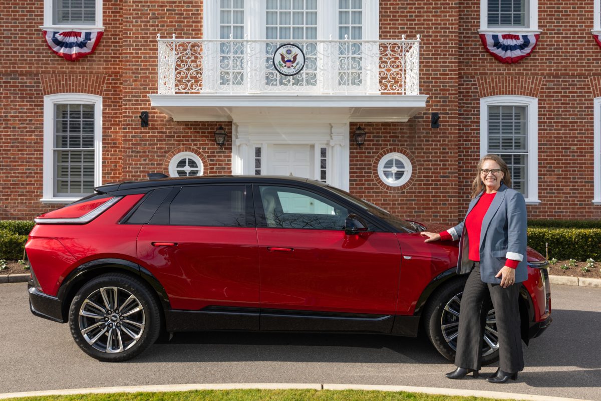 Charge d'Affairs Erica Olson with the Lyriq SUV
