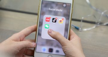 'Trusted member' of ACT's Chinese community allegedly spied on a Buddhist group for China's government