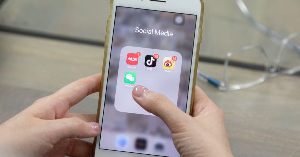 'Trusted member' of ACT's Chinese community allegedly spied on a Buddhist group for China's government