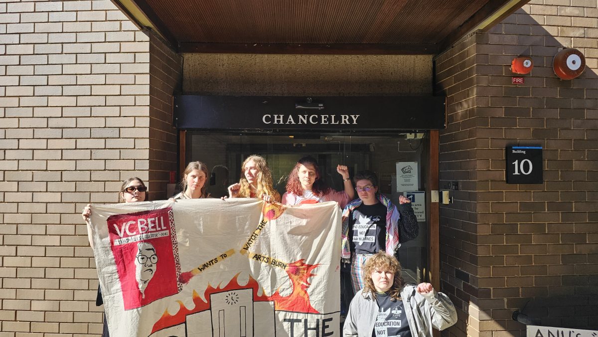 ANU protesters block the front of the Chancellery 
