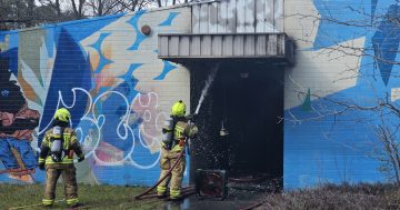 Suspicious dumpster fire damages abandoned building in Kingston