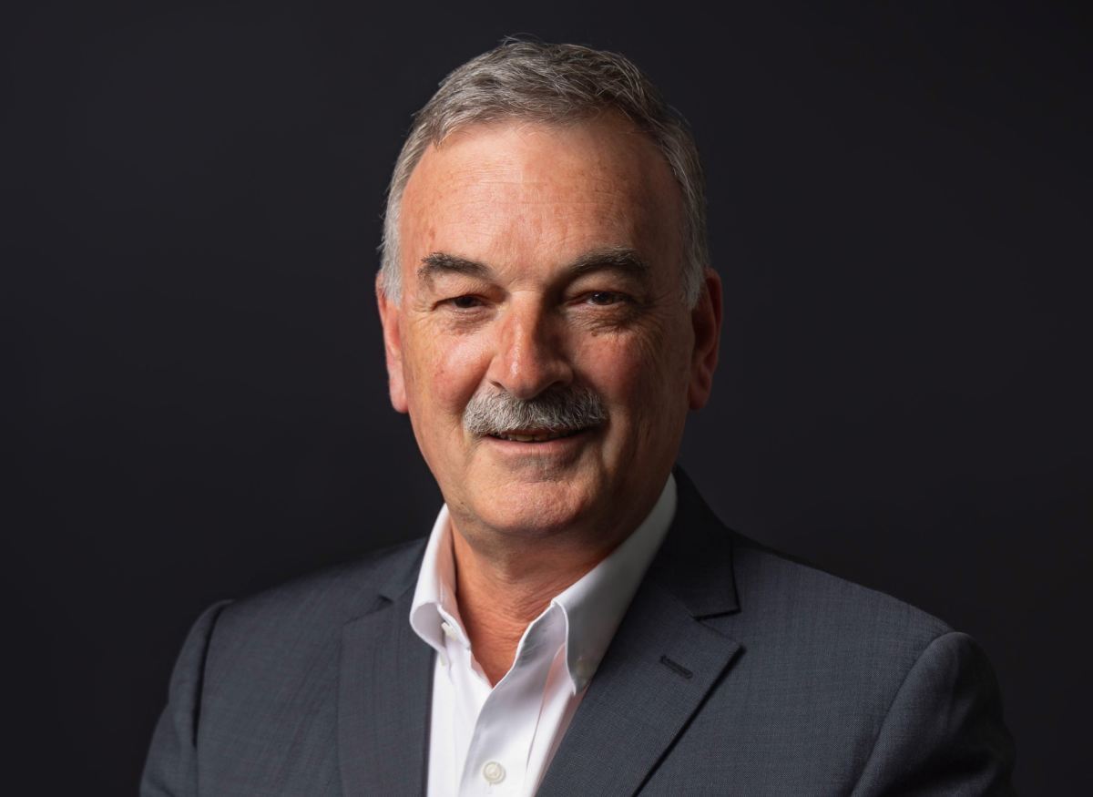 smiling man in office attire