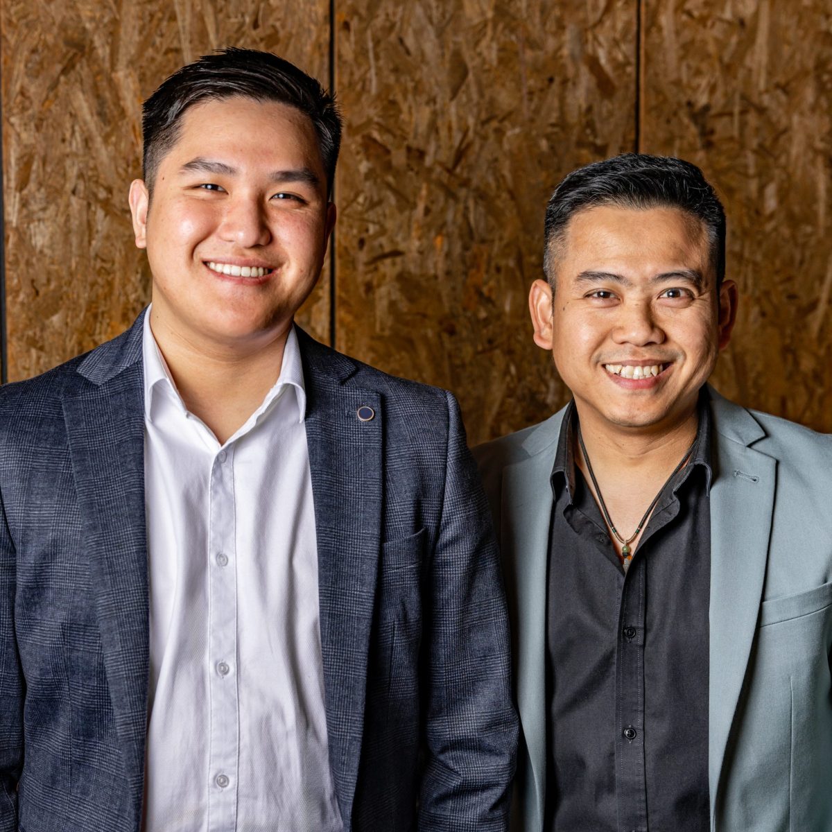 Two men in suits.