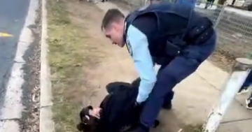 Police allegedly filmed shoving woman outside Bungendore school