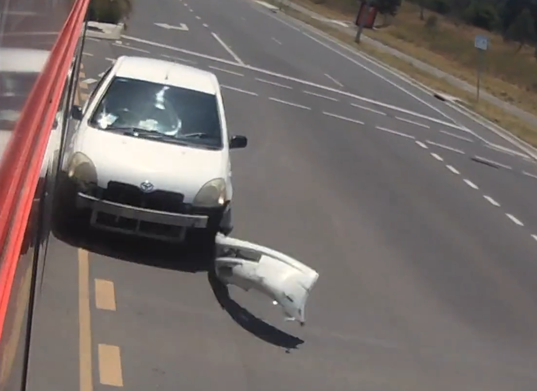 car missing its bumper after hitting light rail vehicle