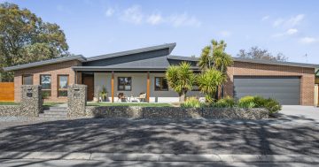 Single-level corner block home built with the needs of a modern family in mind