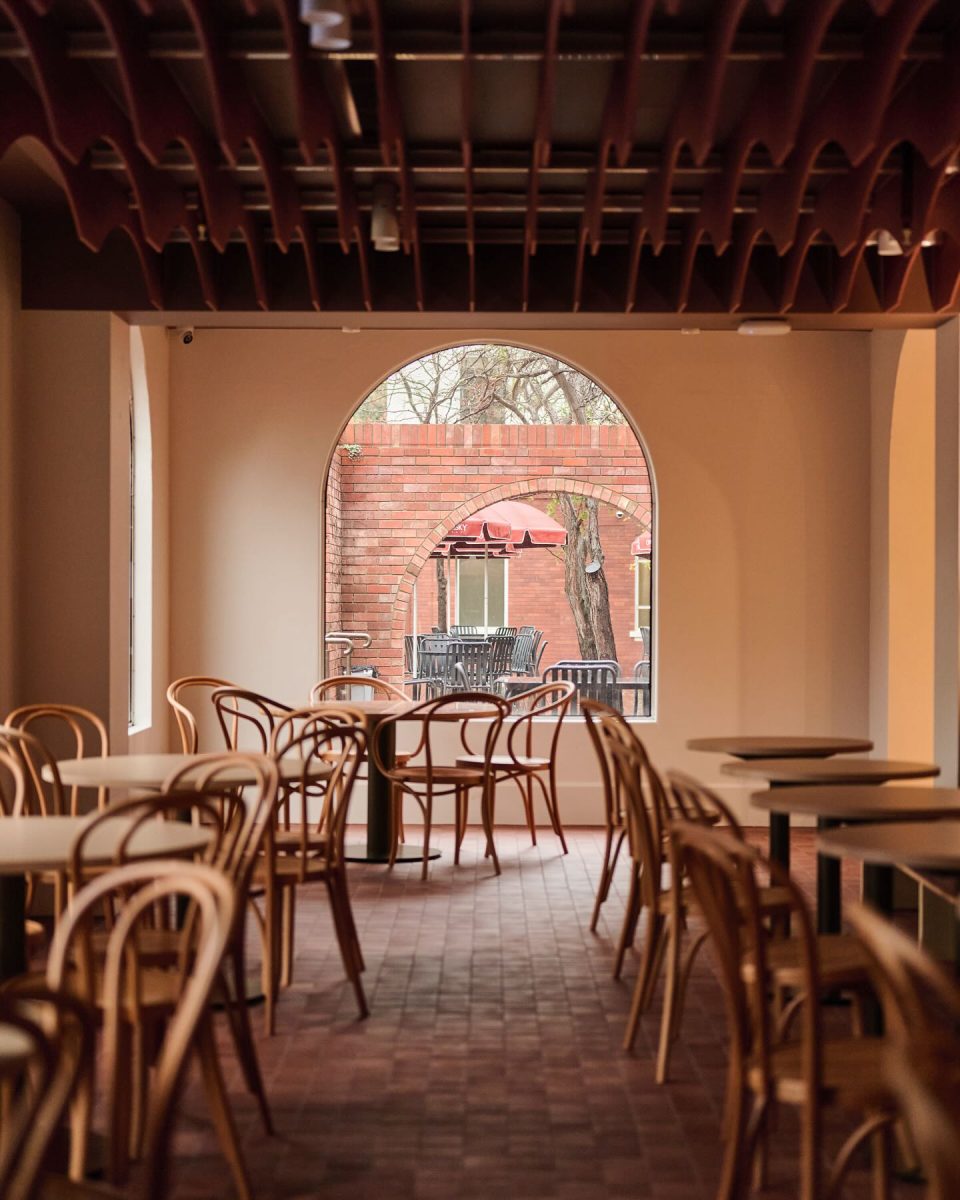 Cafe interior in warm tones.