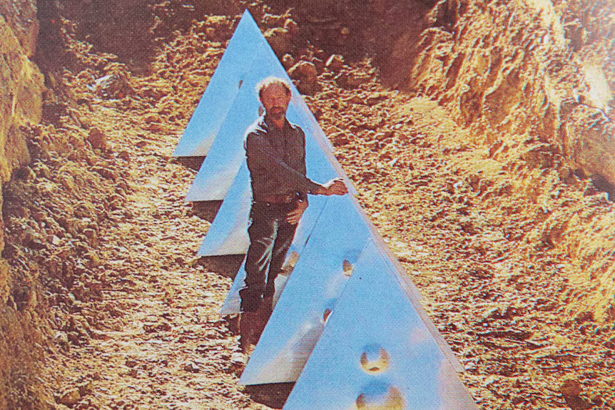 The Earthwork sculpture in Commonwealth Park with artist Bert Flugelman.