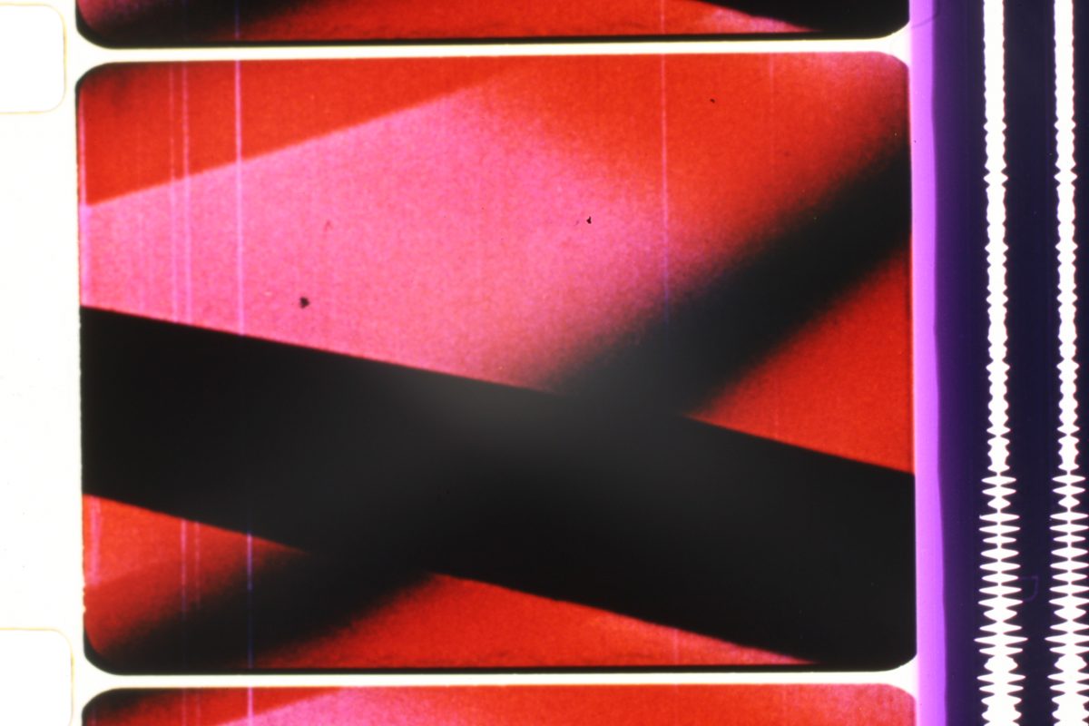 Abstracted black cross on a pink red ground