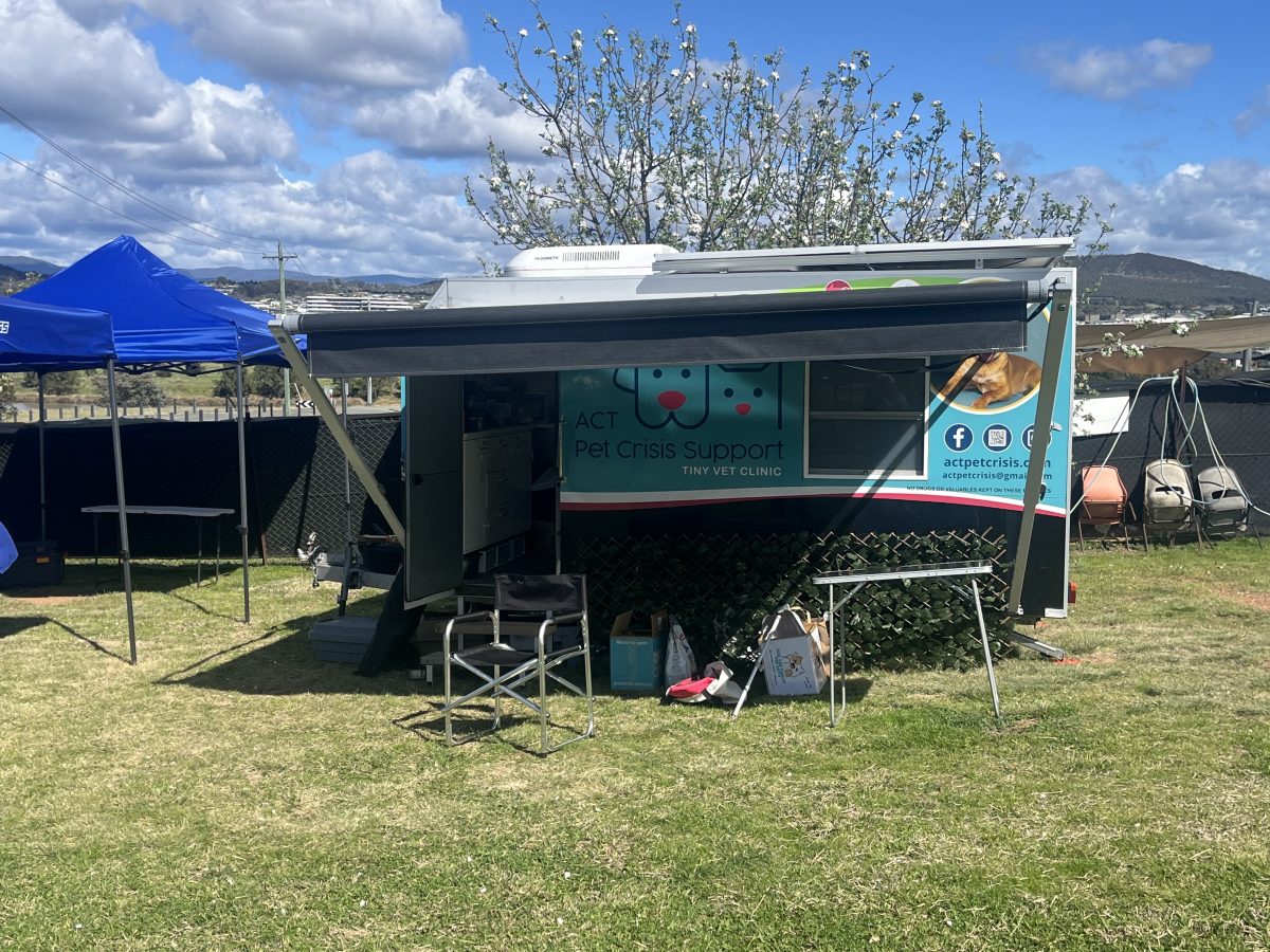 A caravan with a shade sail extending from its side