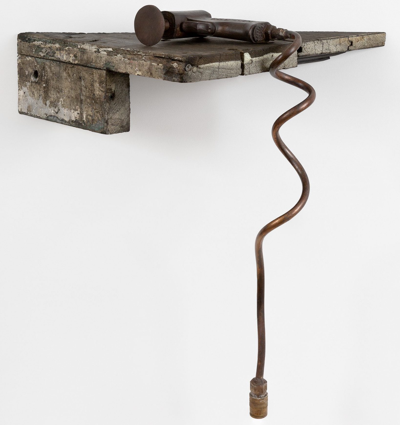Electric power tool interpreted as a metal sculpture
