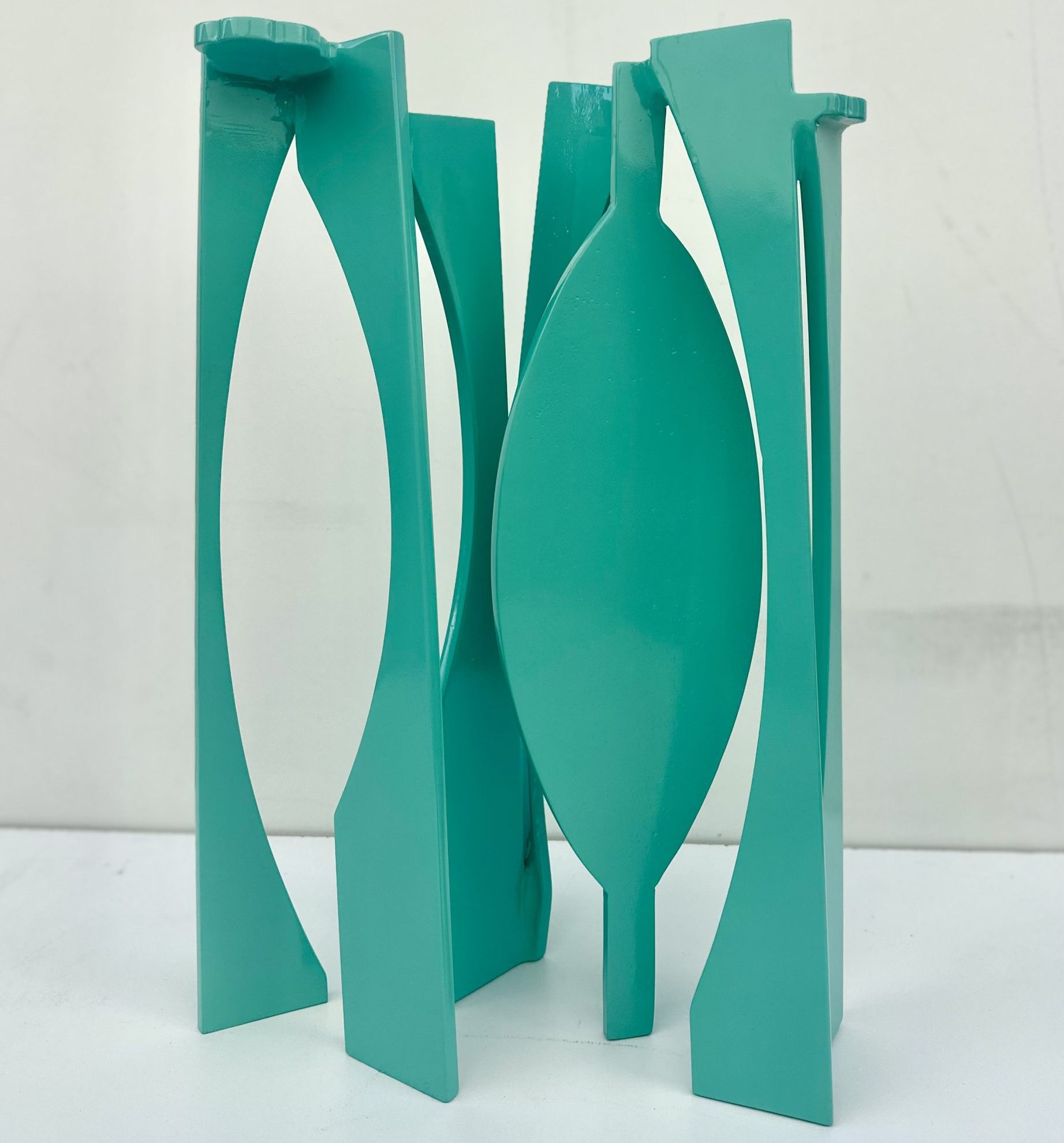 Elegant green metal sculpture