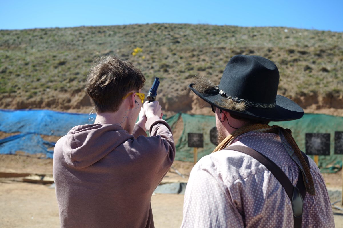 Craig Tregear runs a first-time shooter through the steps of cowboy action. 