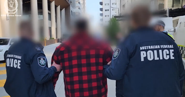 Bikies allegedly stopped women, children leaving during Queanbeyan double stabbing