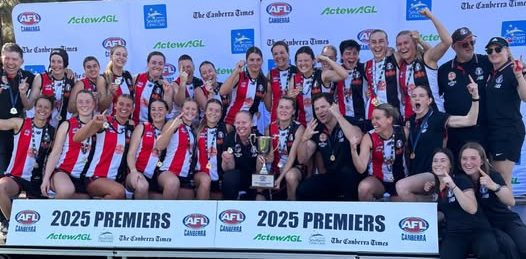 female AFL players celebrating