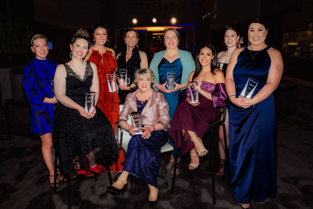 Canberra Women in Business Awards winners holding their awards