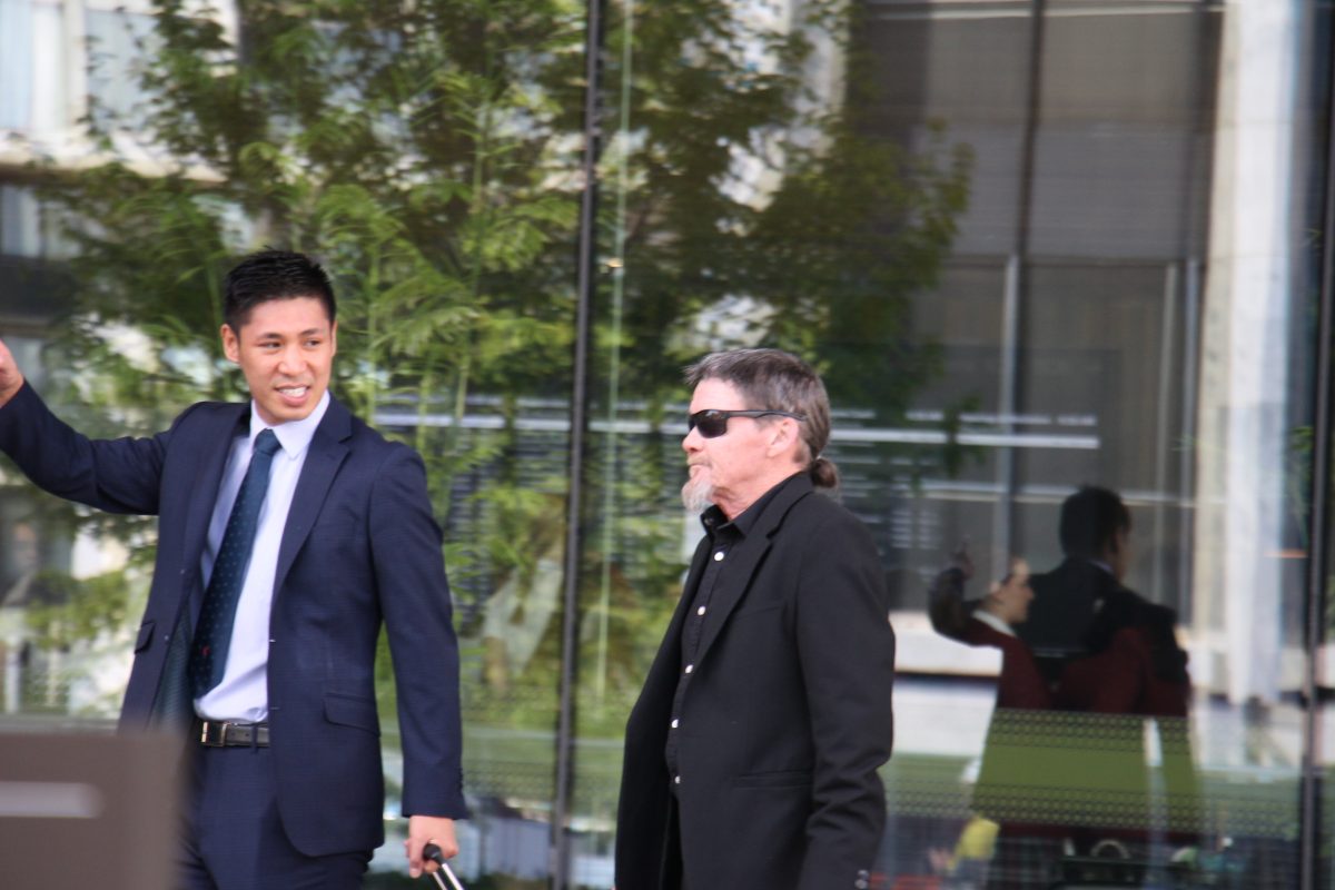Two men walking together