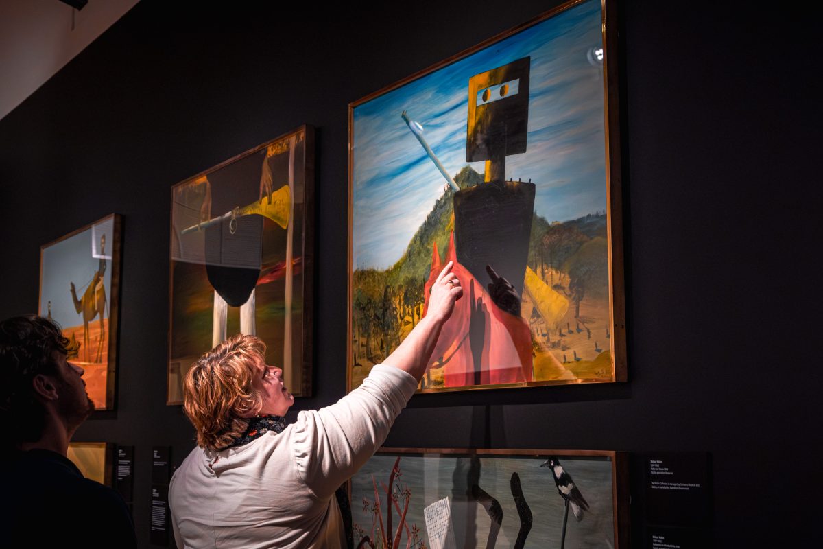 Nolan paintings in a gallery