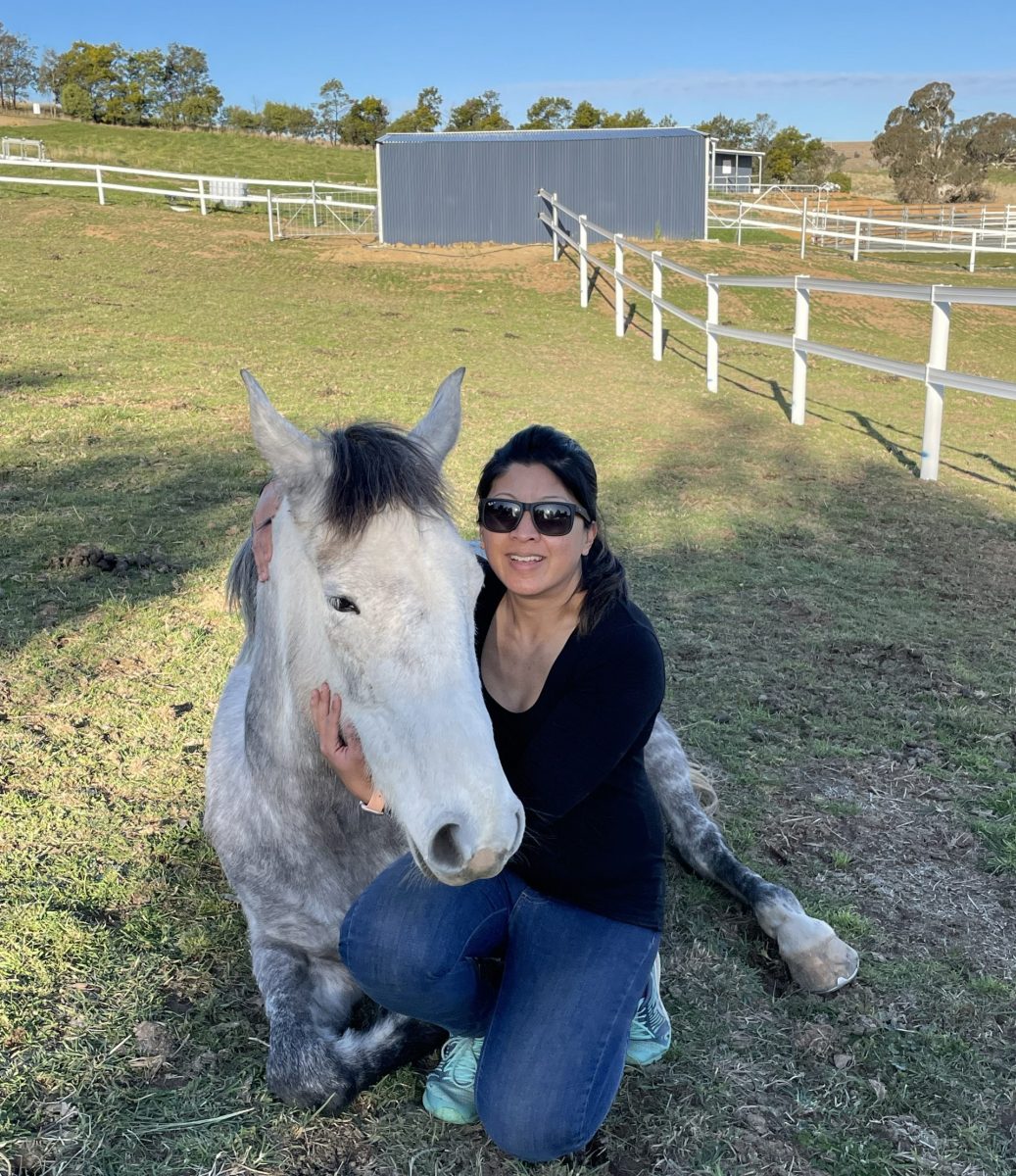 Anna Kitchin with school horse Blue