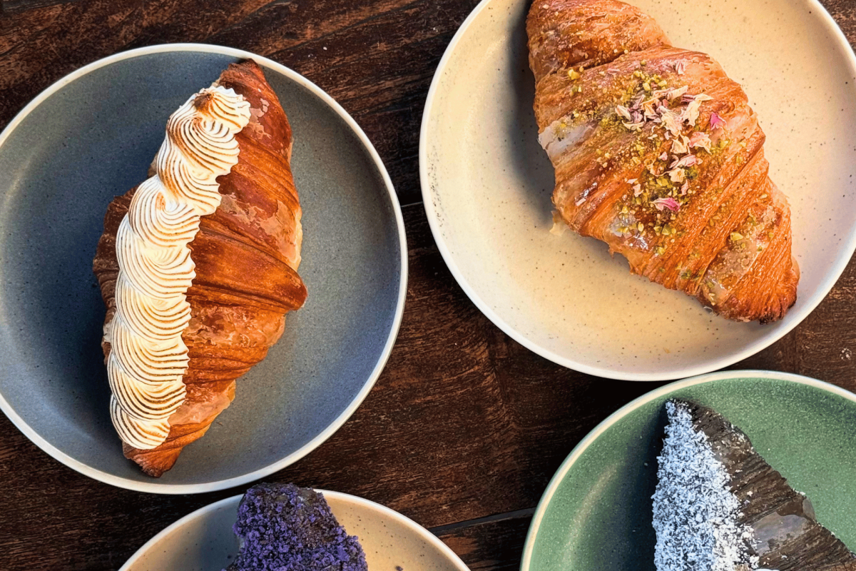 A selection of pastries on plates.
