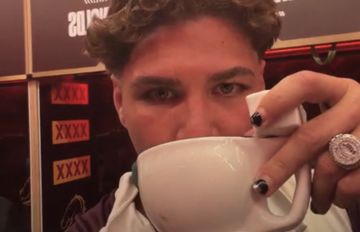 Reece Walsh drinking from a toilet cup