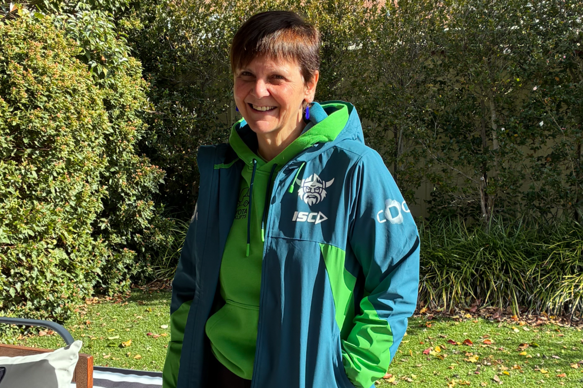 Raiders fan Michele wearing Raiders merch