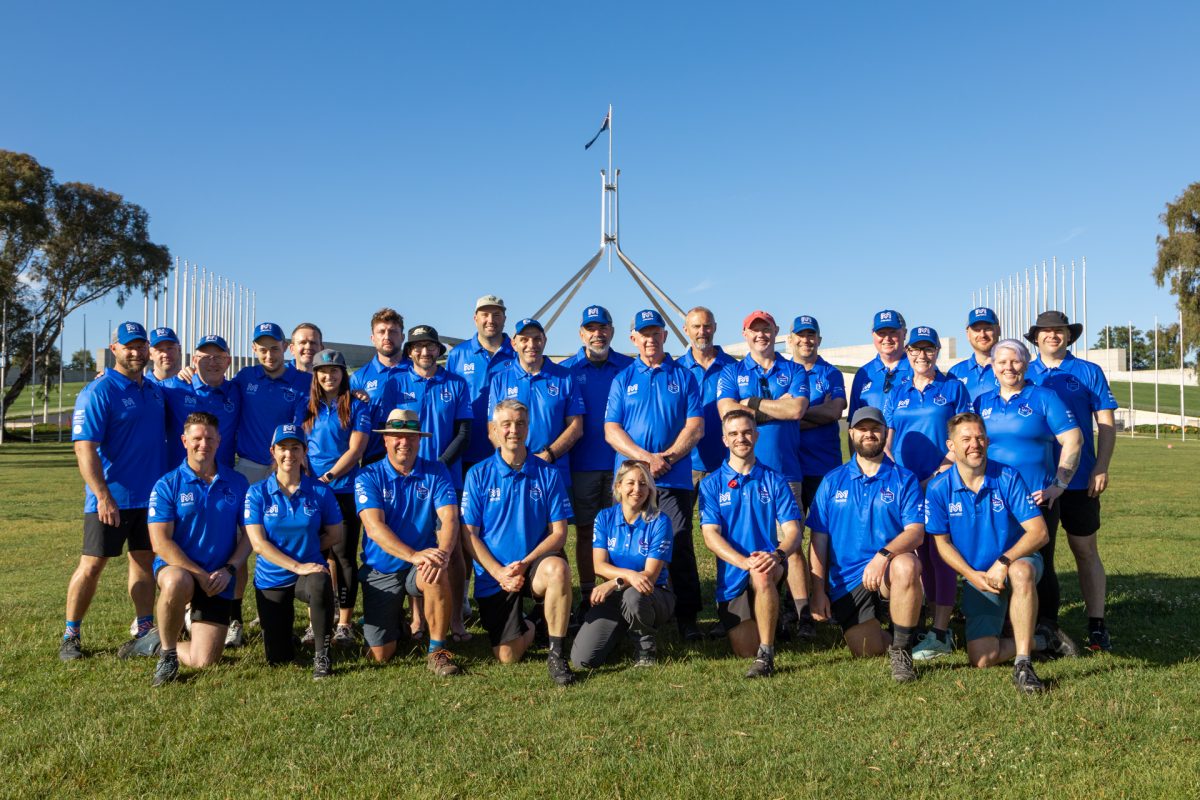group of people outside parliament house