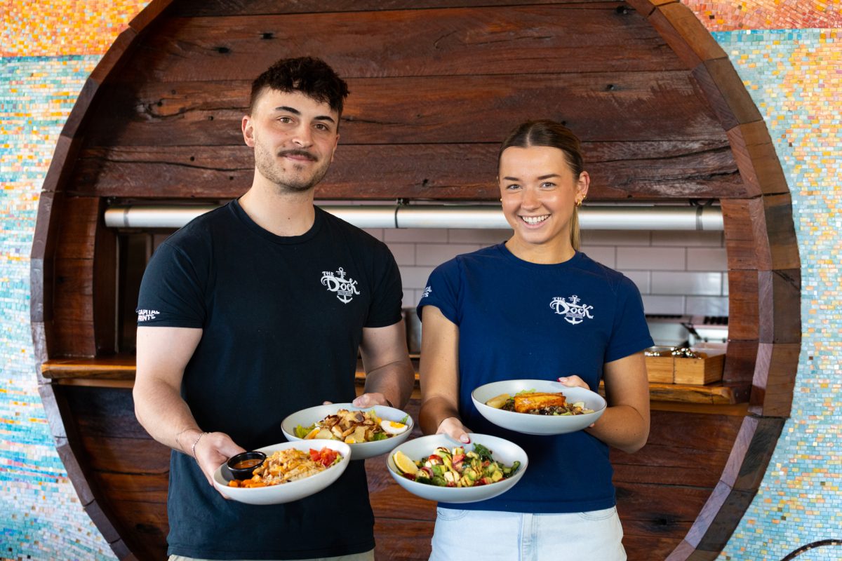 Jasper and Abbey showcase The Dock's new summer menu.