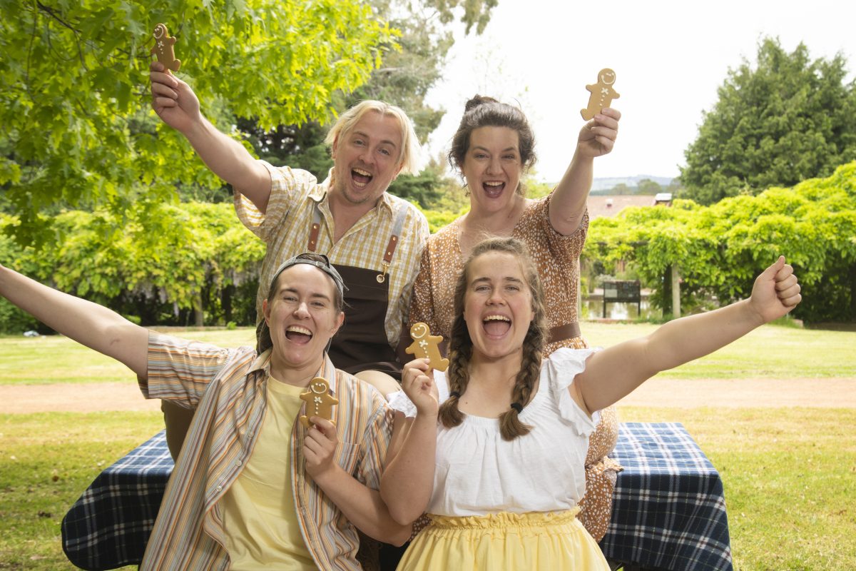 Hansel and gretel performers cheering for camera