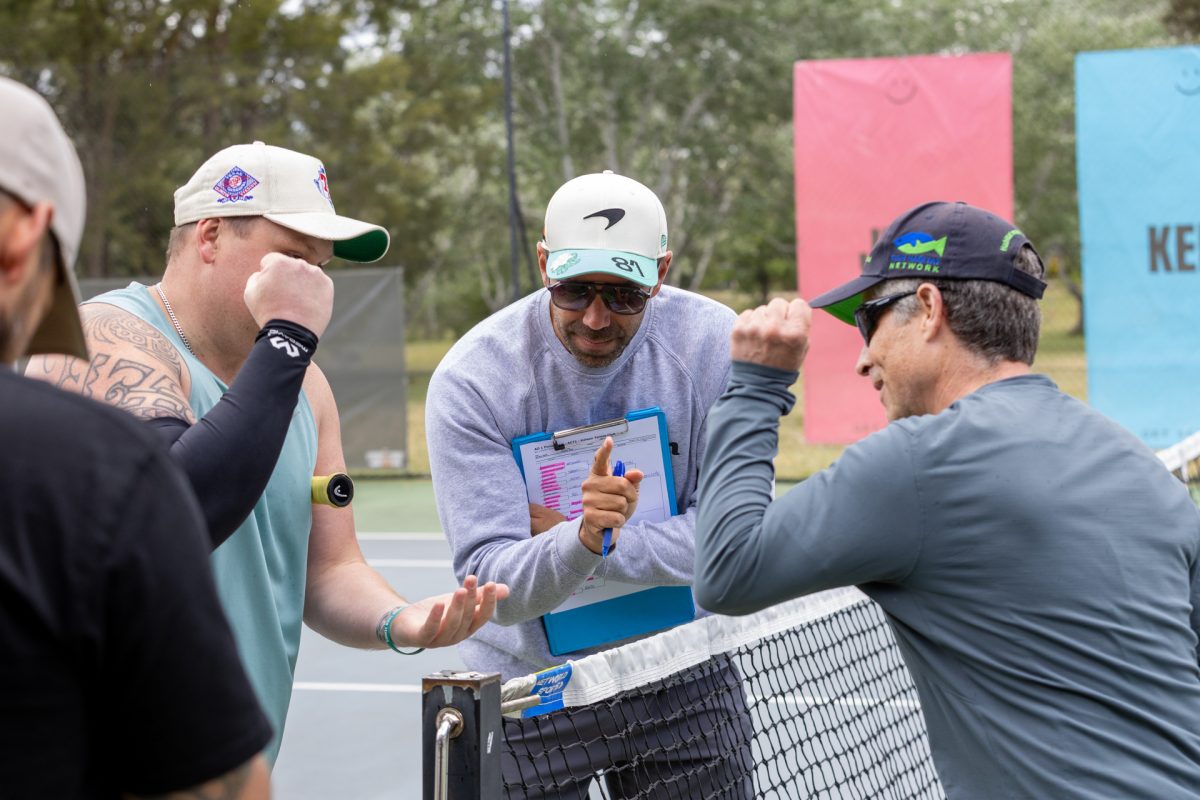 two people doing paper scissors rocks
