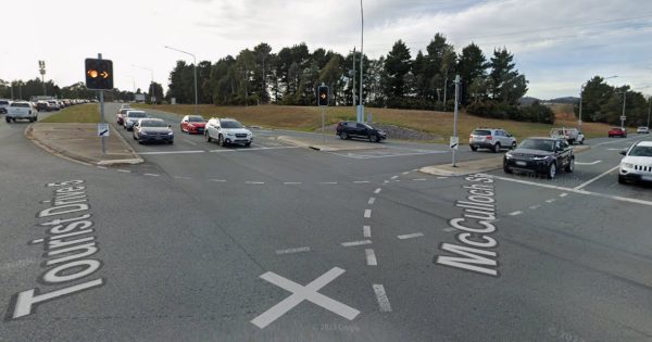 Traffic chaos after two-car crash on Cotter Road