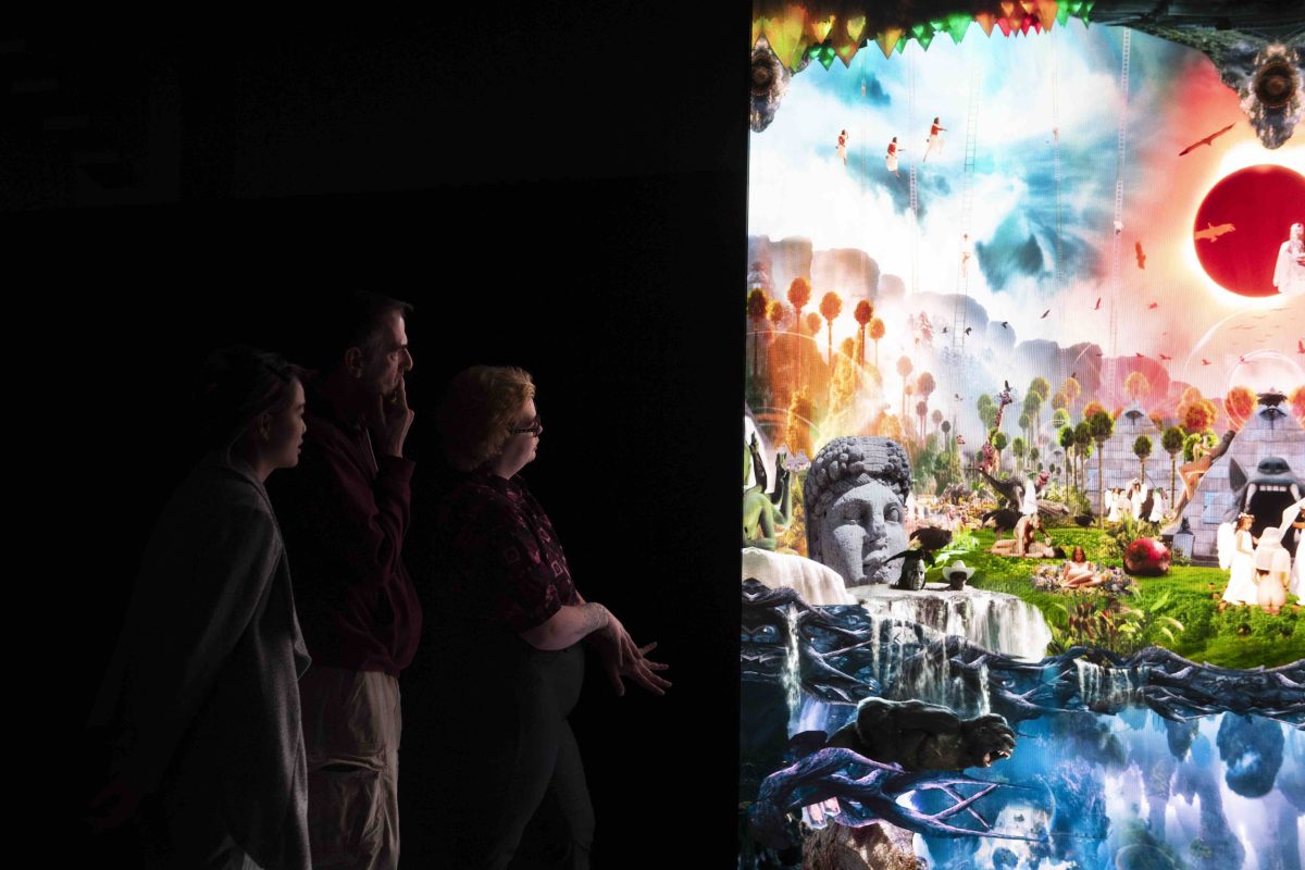 People watching a video screen